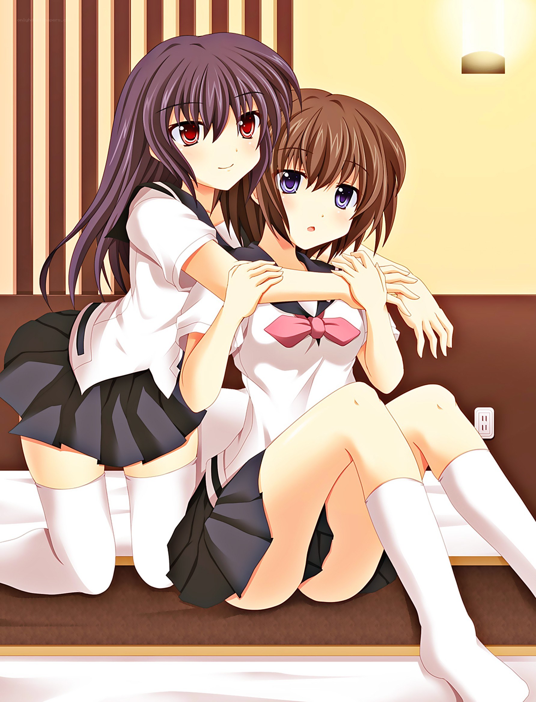Two girls in school uniforms