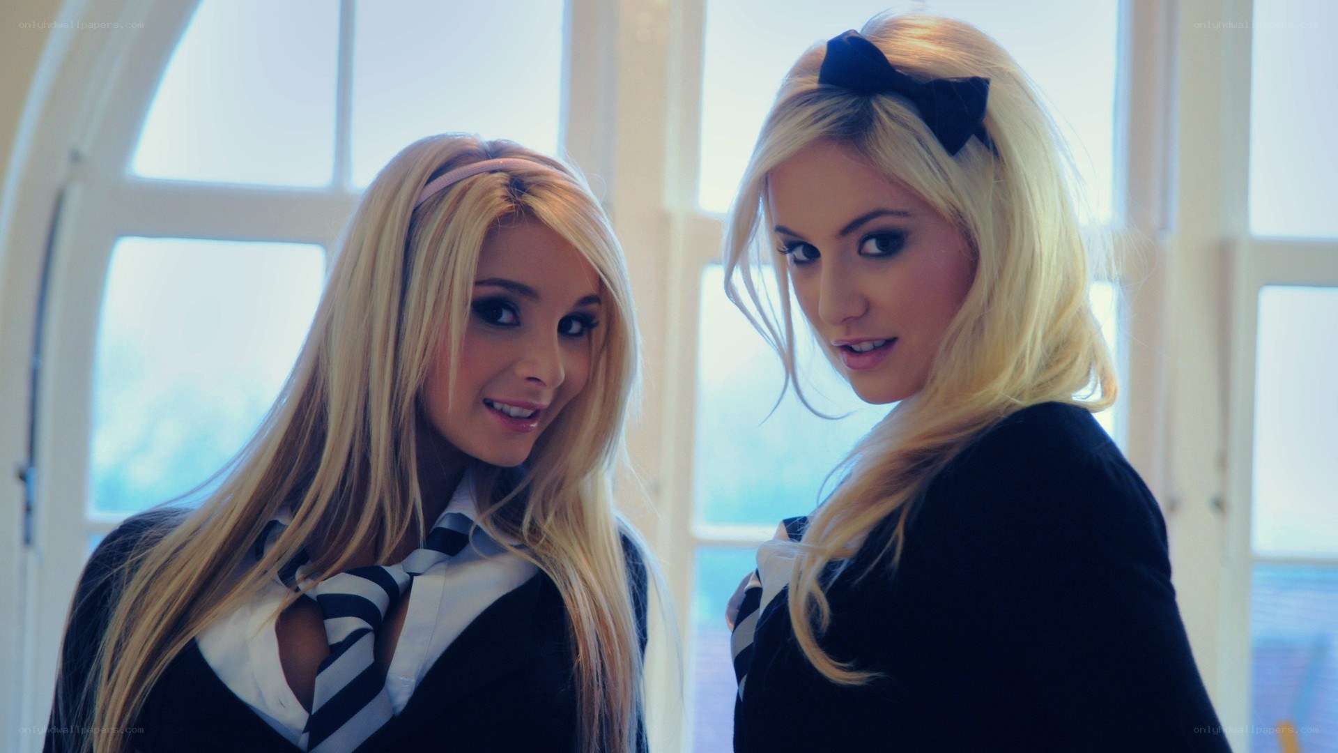 two girls in school uniforms