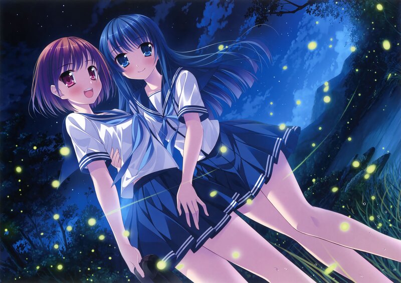 Two girls in school uniforms at night