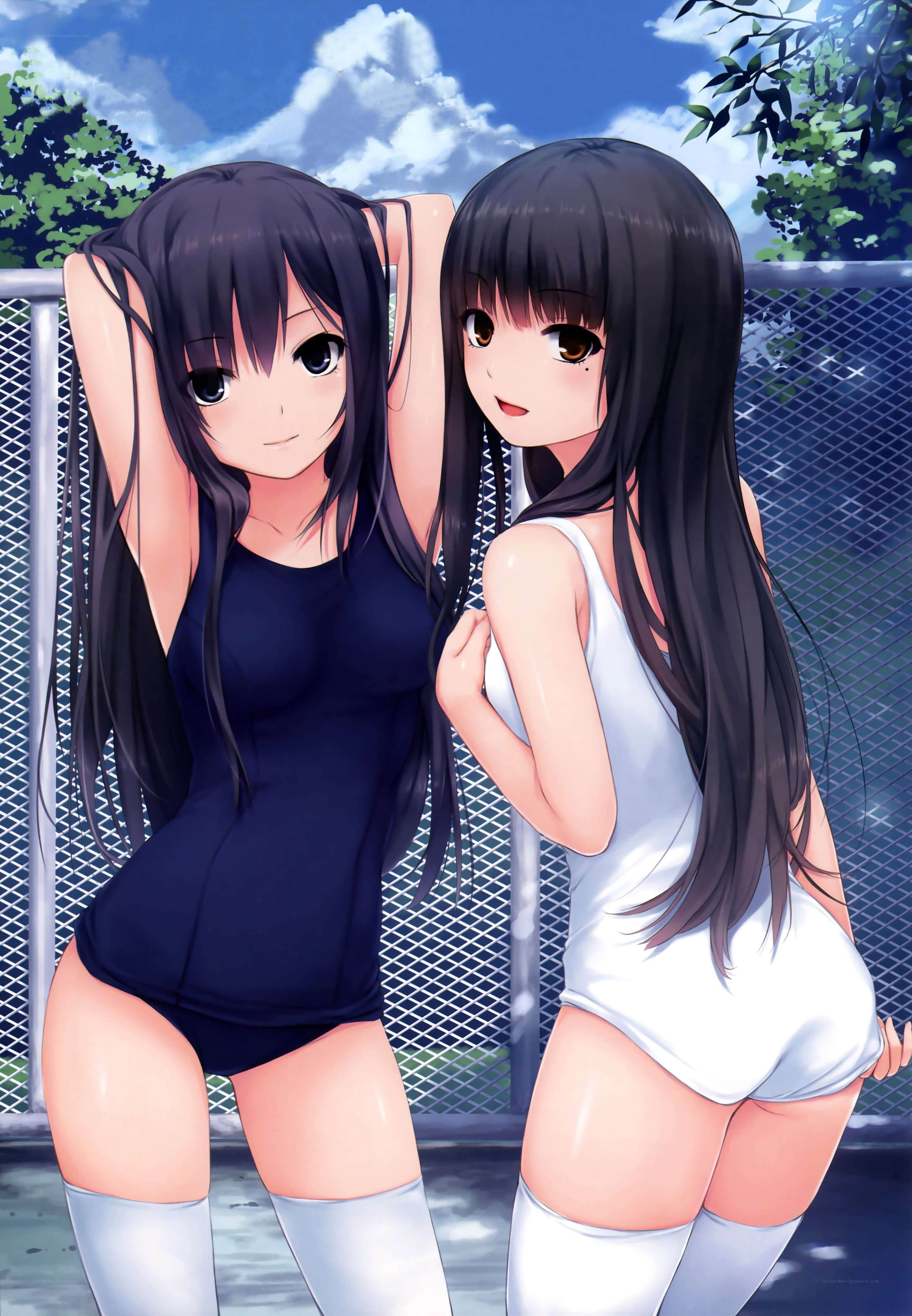 Two girls in swimsuits