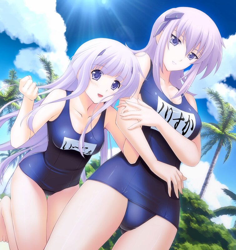 two girls in swimsuits at beach