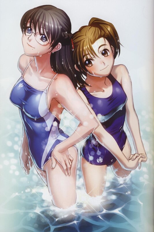 Two girls in swimsuits at pool