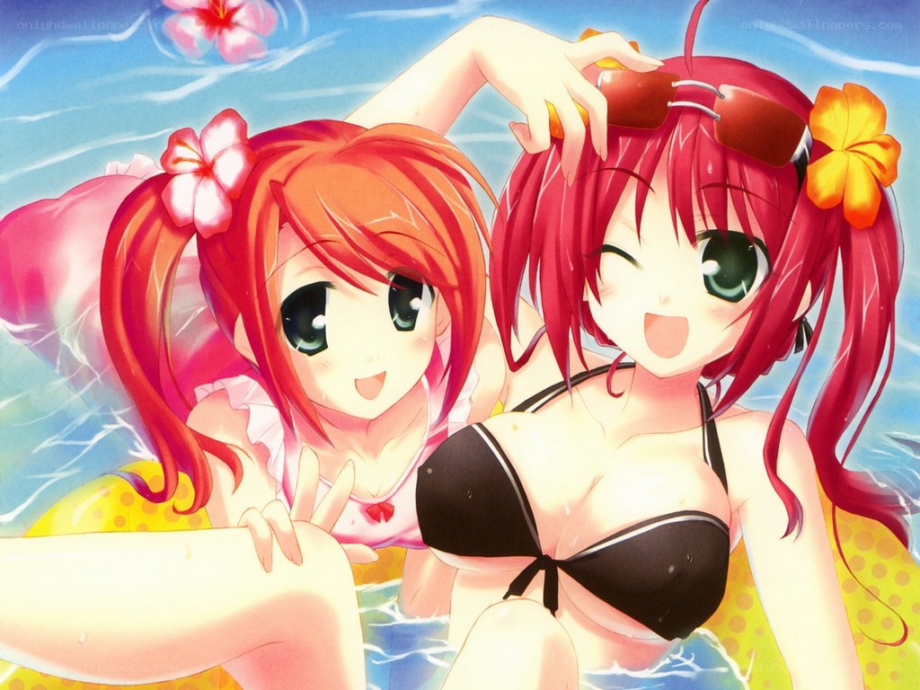Two girls in swimsuits at pool