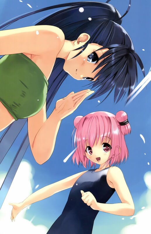 Two girls in swimsuits at the pool