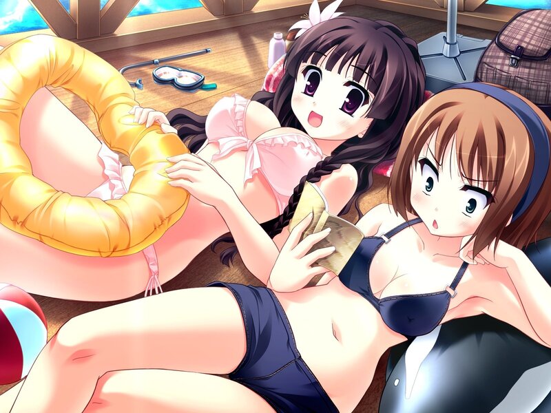 Two girls in swimsuits on a boat