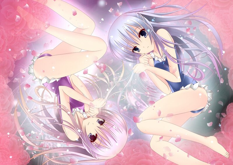 Two girls in swimsuits with petals