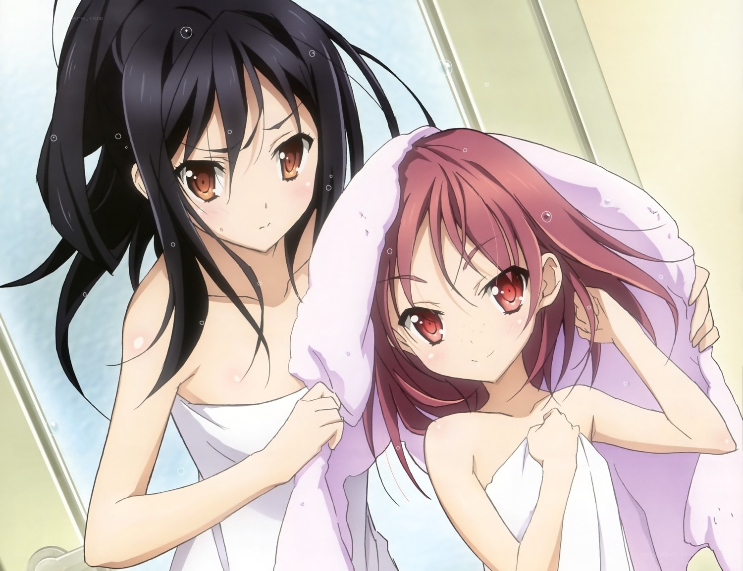 Two girls in towels after bath