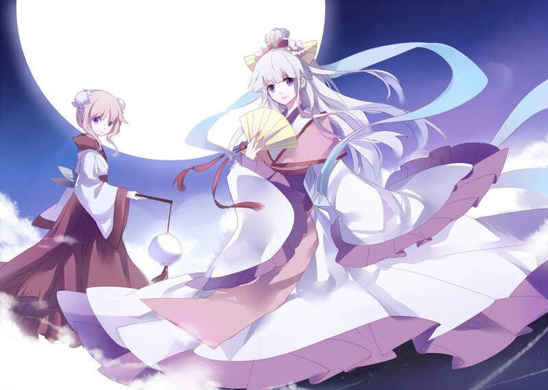 Two girls in traditional attire under moonlight