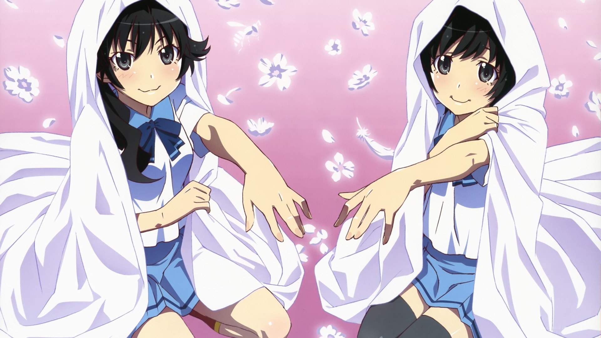 Two girls in white cloaks