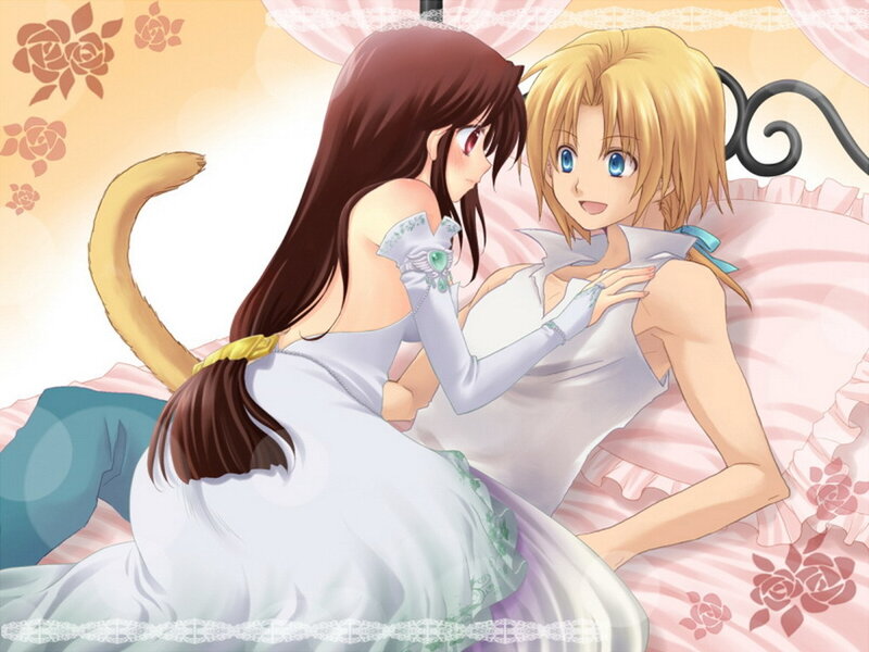 Two girls in white dresses on a bed