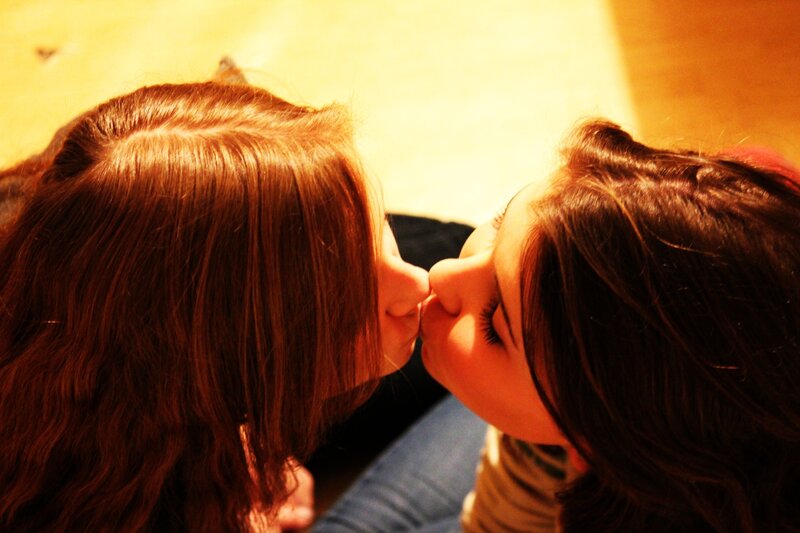 two girls kissing
