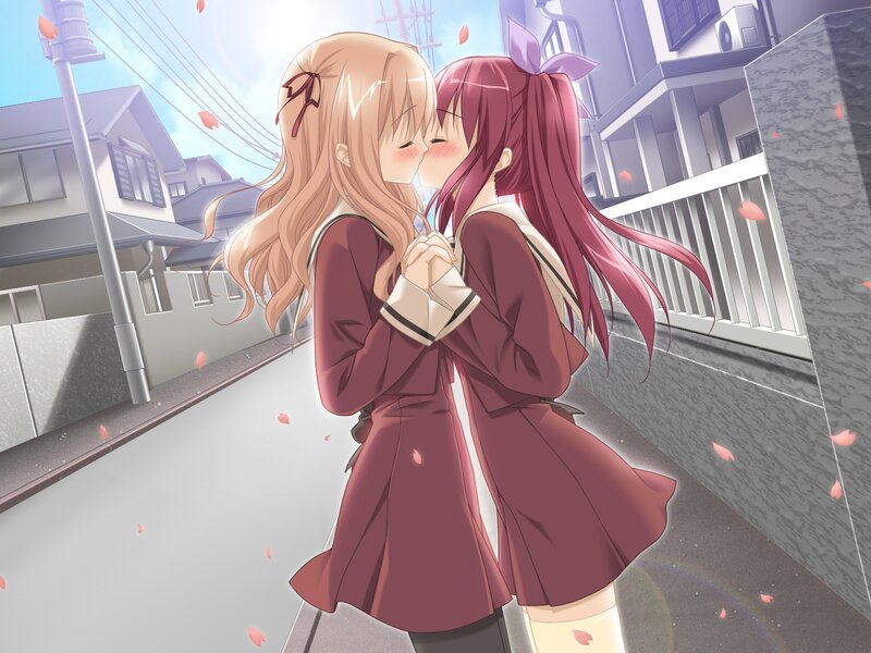 Two girls kissing in the street