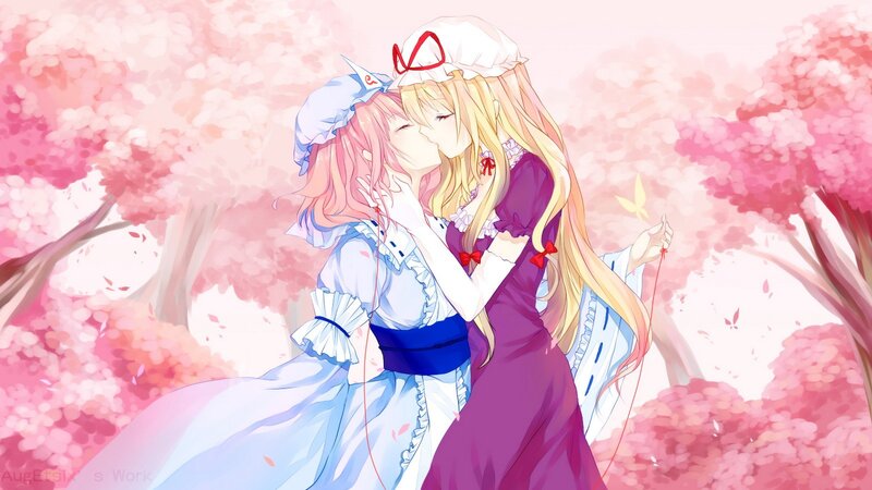two girls kissing under cherry blossoms