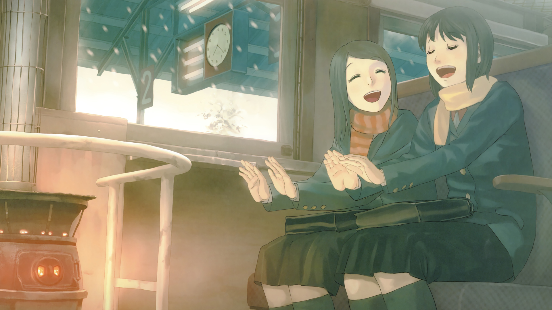 Two girls laughing on a train