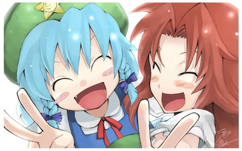 Two girls laughing together
