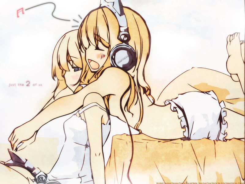 Two girls listening to music