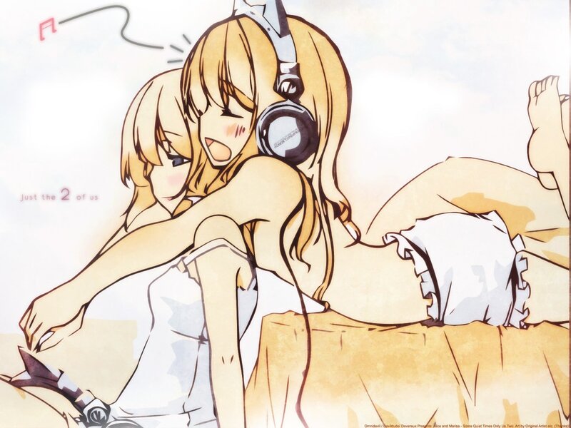 Two girls listening to music