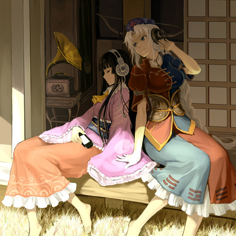 Two girls listening to music