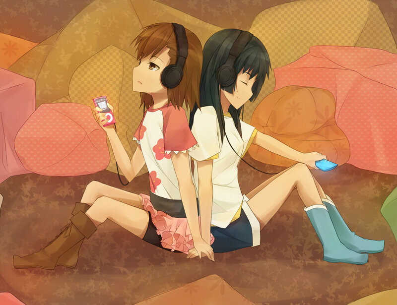 Two girls listening to music