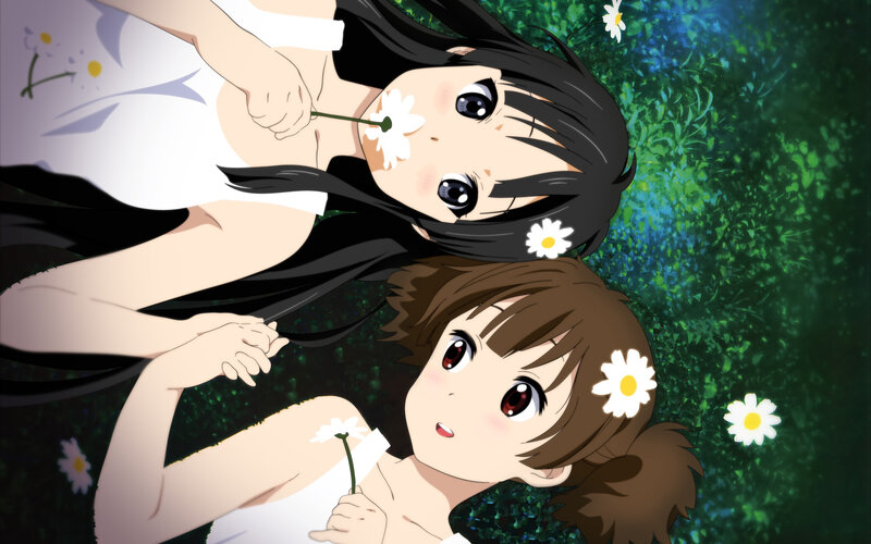 Two Girls Lying in Grass — Green, Serene