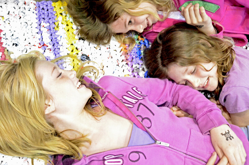Two Girls Lying on Blanket — Purple