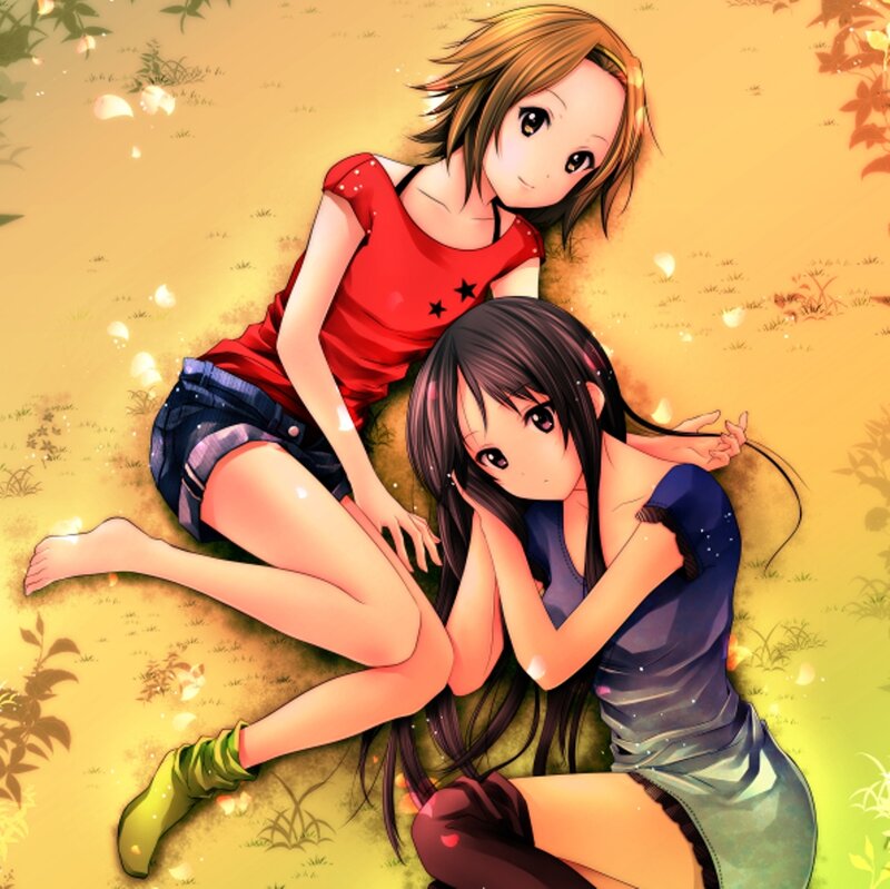 Two Girls Lying on Grass — Yellow