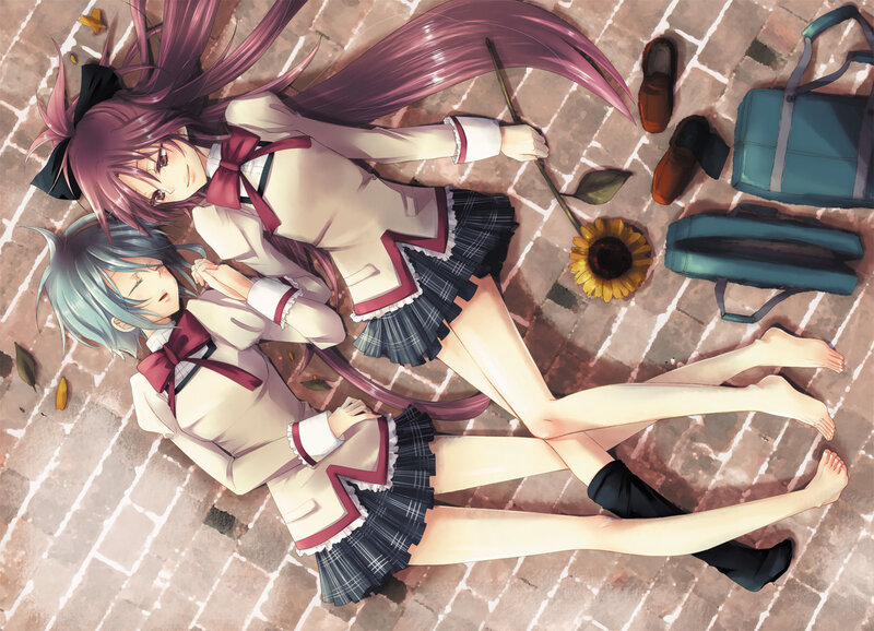 Two Girls Lying on Ground