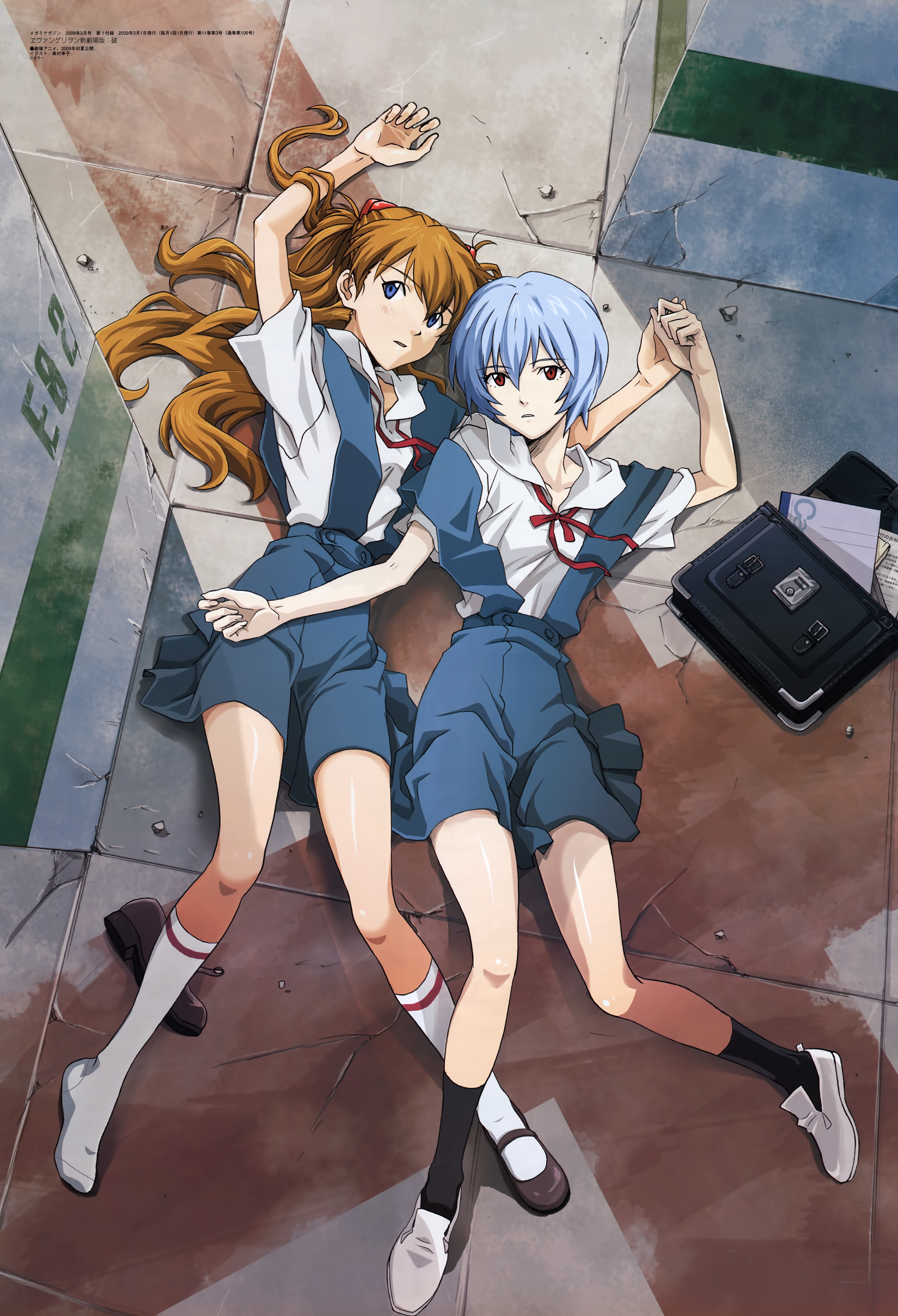 Two girls lying on the ground