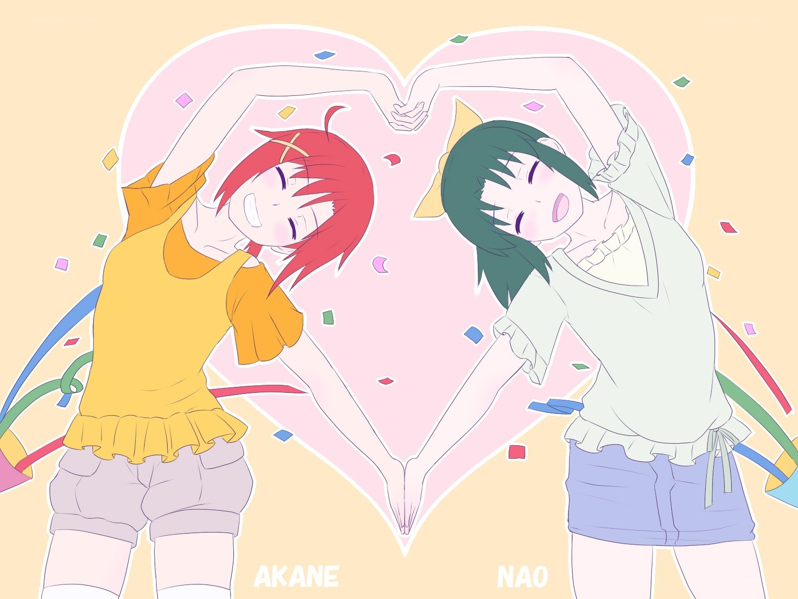 Two girls making a heart shape