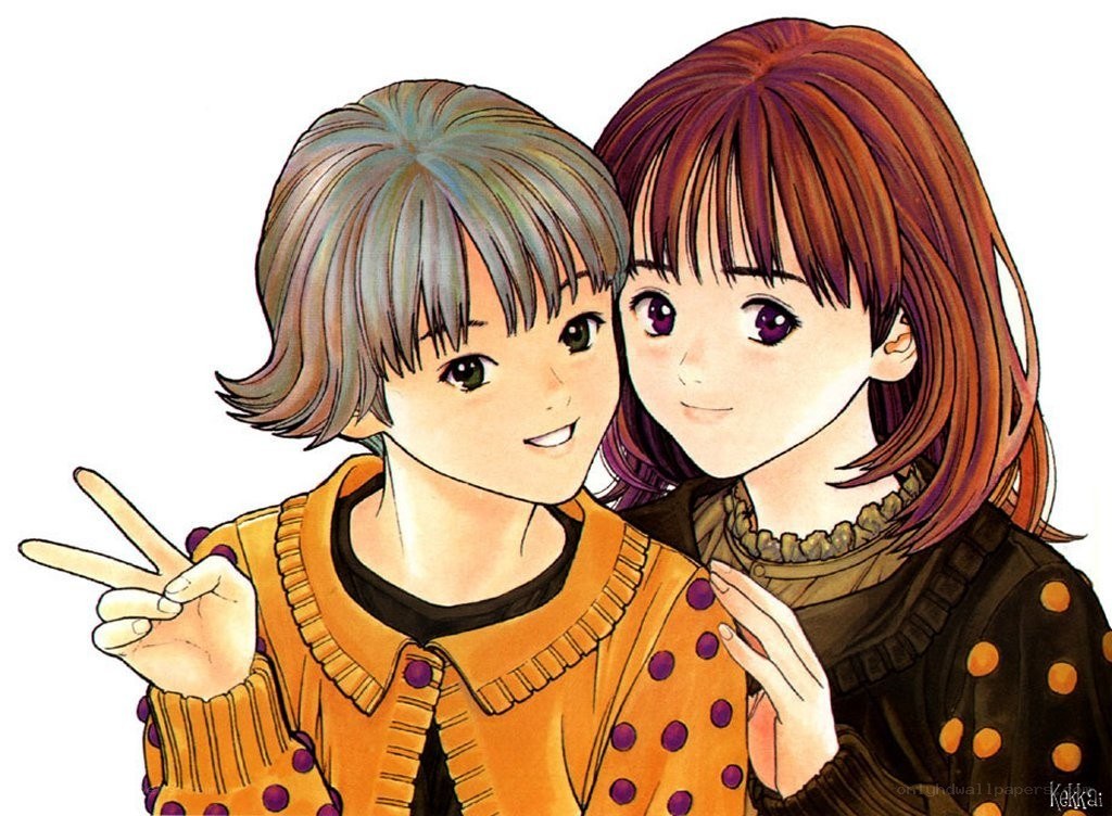 Two girls making peace sign