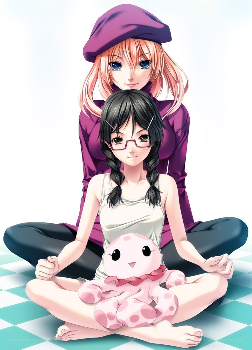 Two girls meditating together