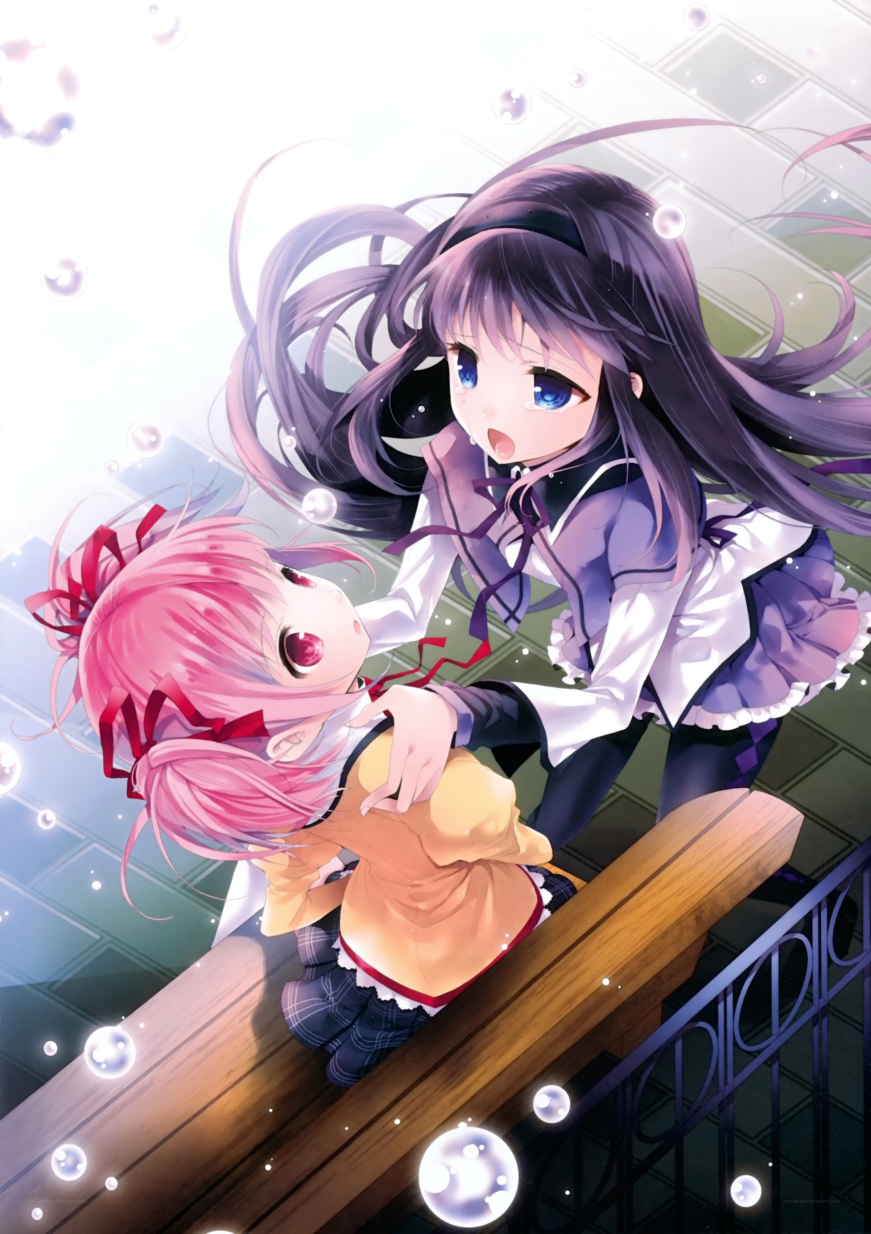 Two girls on a balcony
