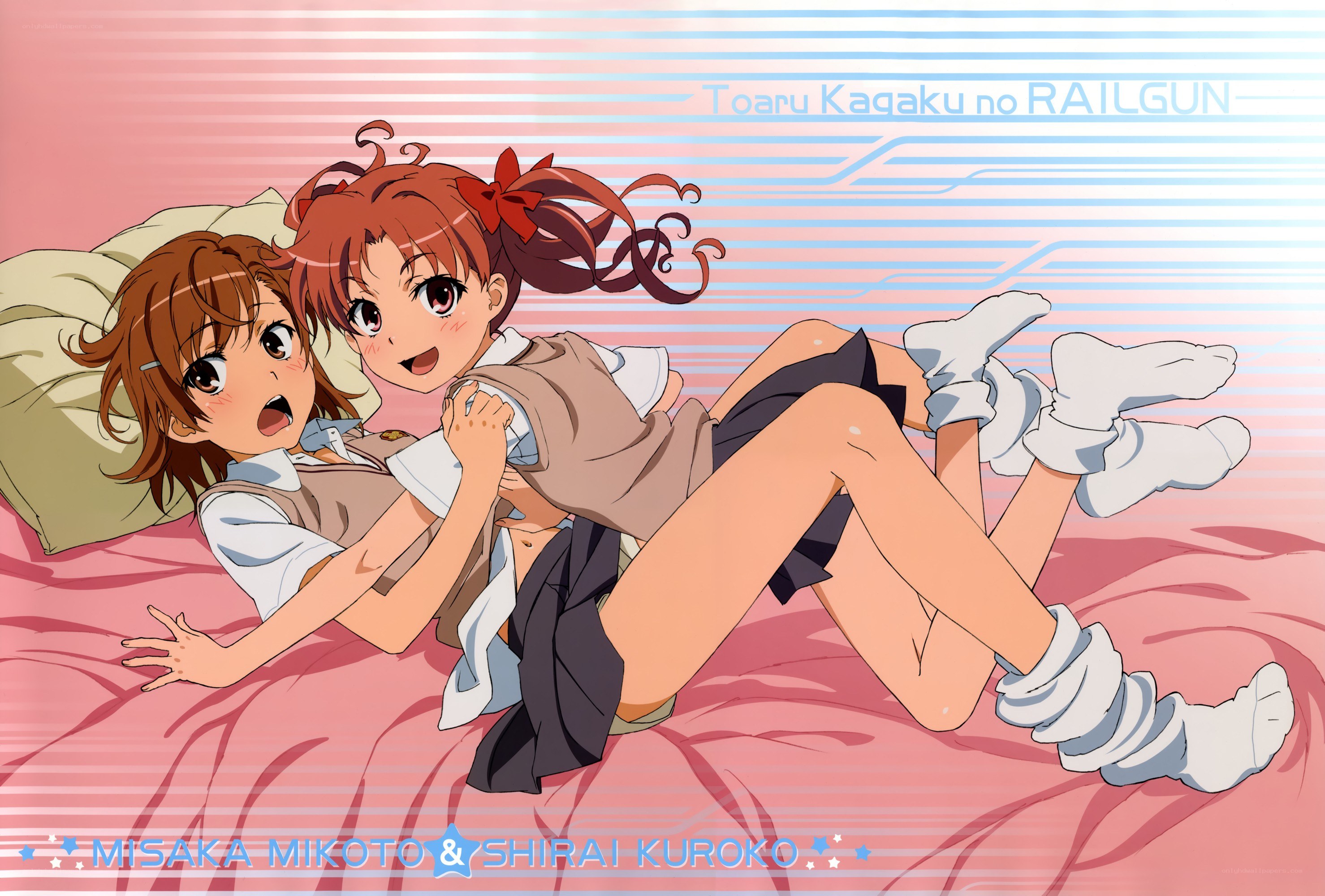 Two girls on a bed