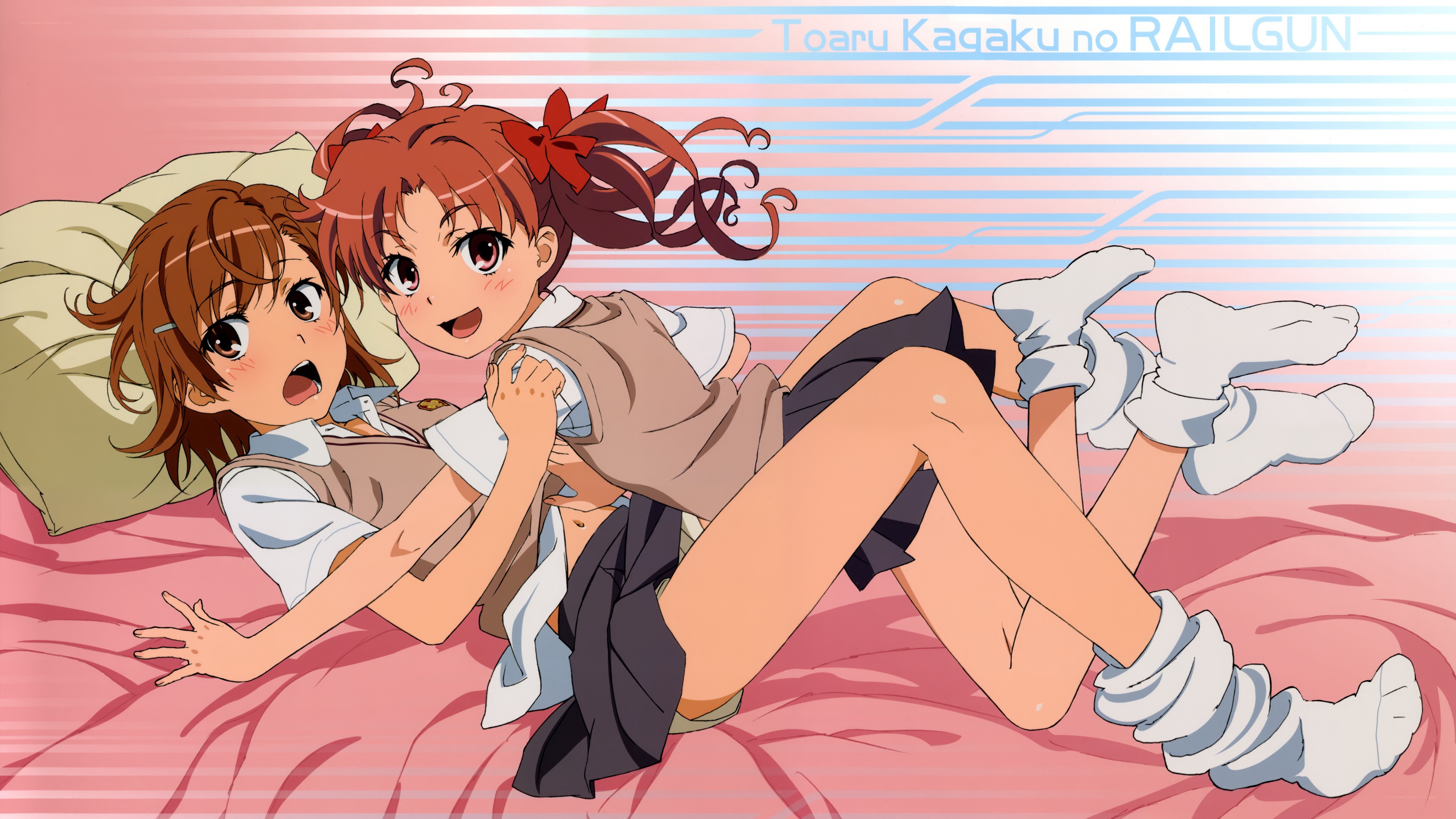 Two girls on a bed