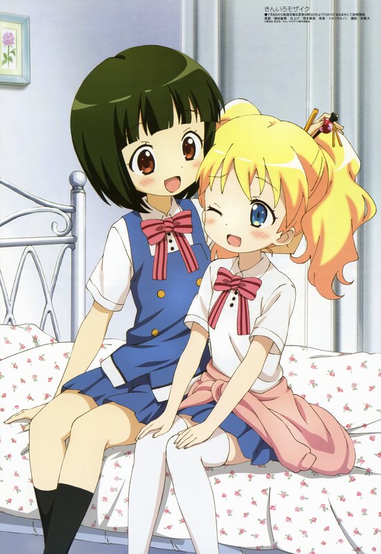 Two girls on a bed
