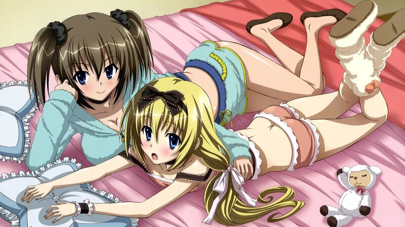 Two girls on a bed
