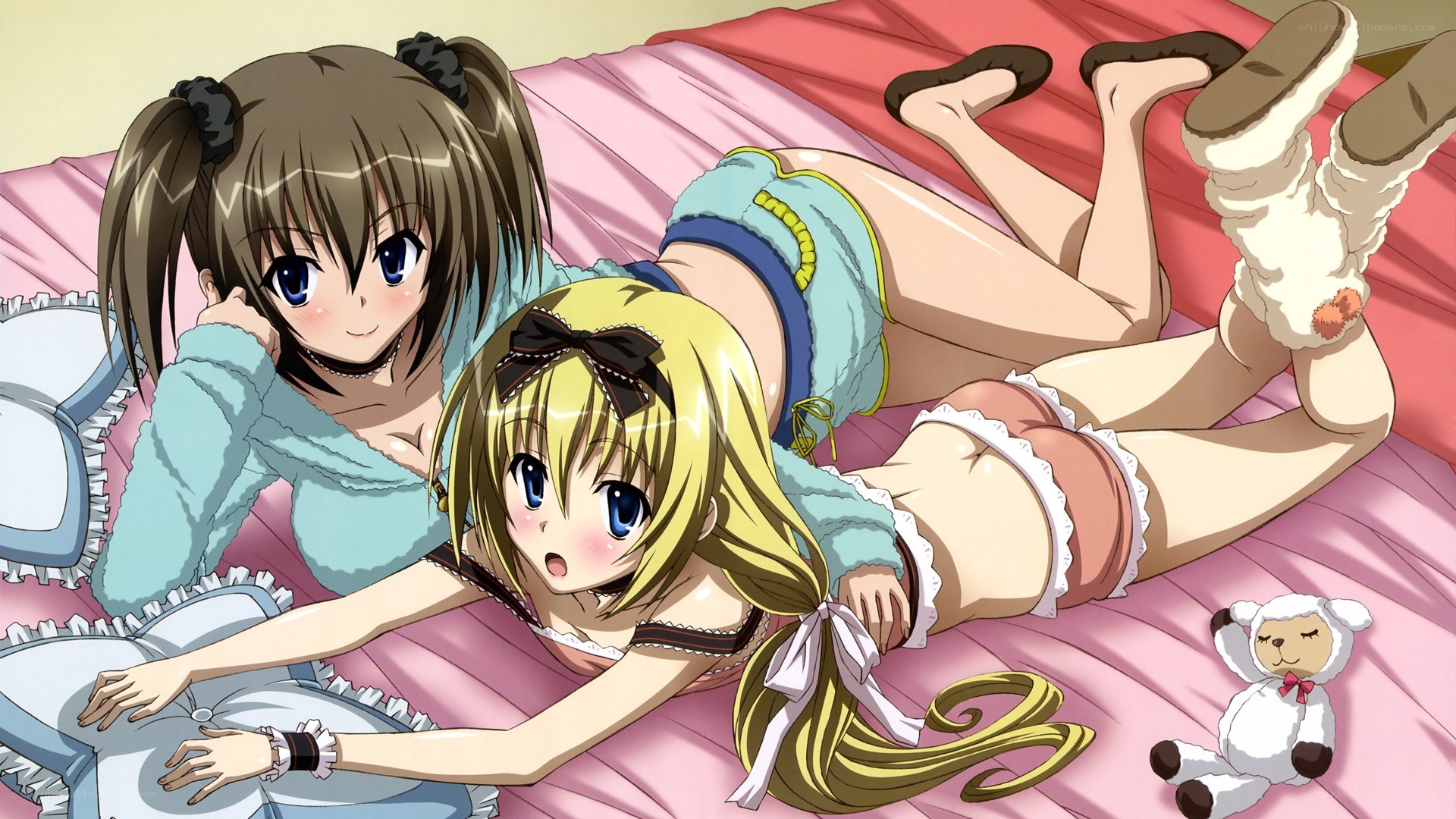 Two girls on a bed