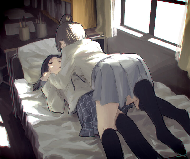 Two girls on a bed