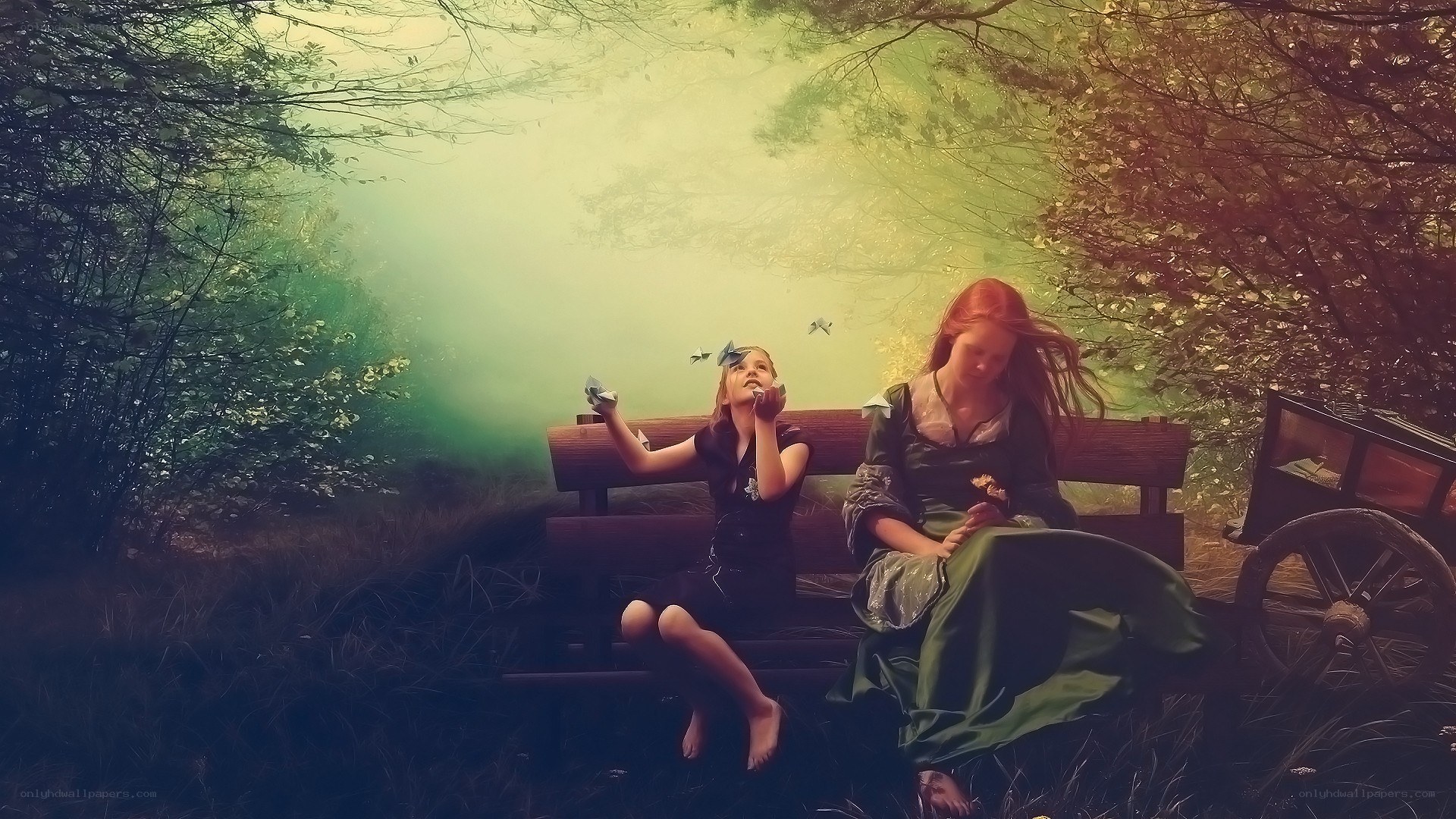Two girls on a bench in the forest
