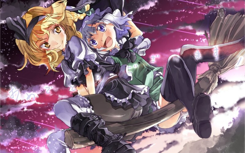 Two girls on a broomstick