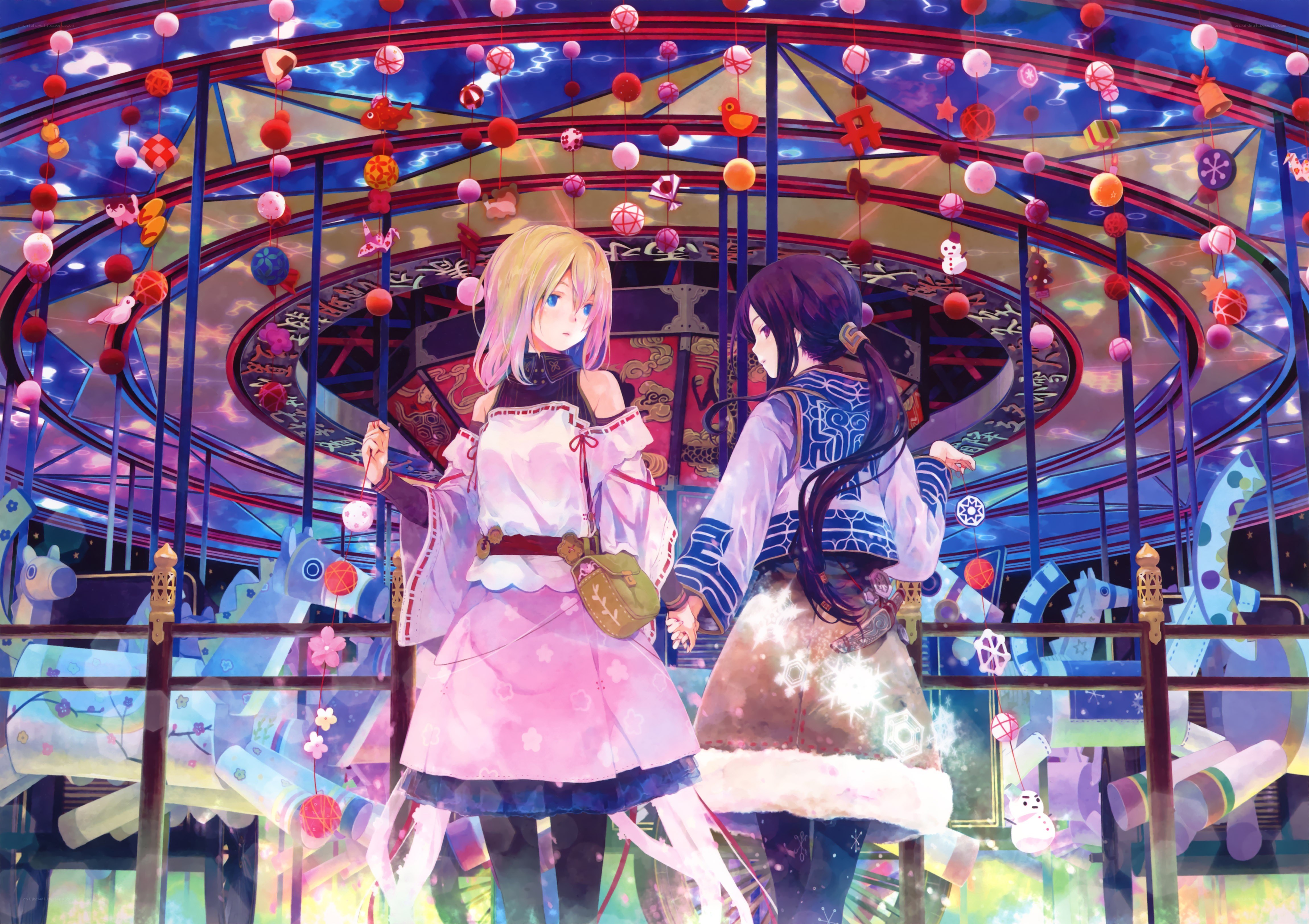 Two girls on a carousel