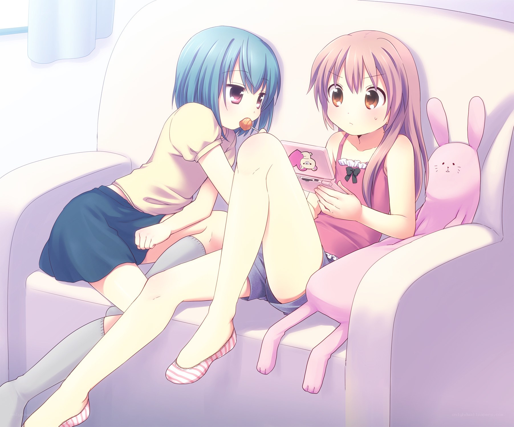 Two girls on a couch