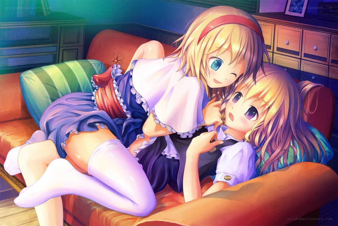 Two girls on a couch