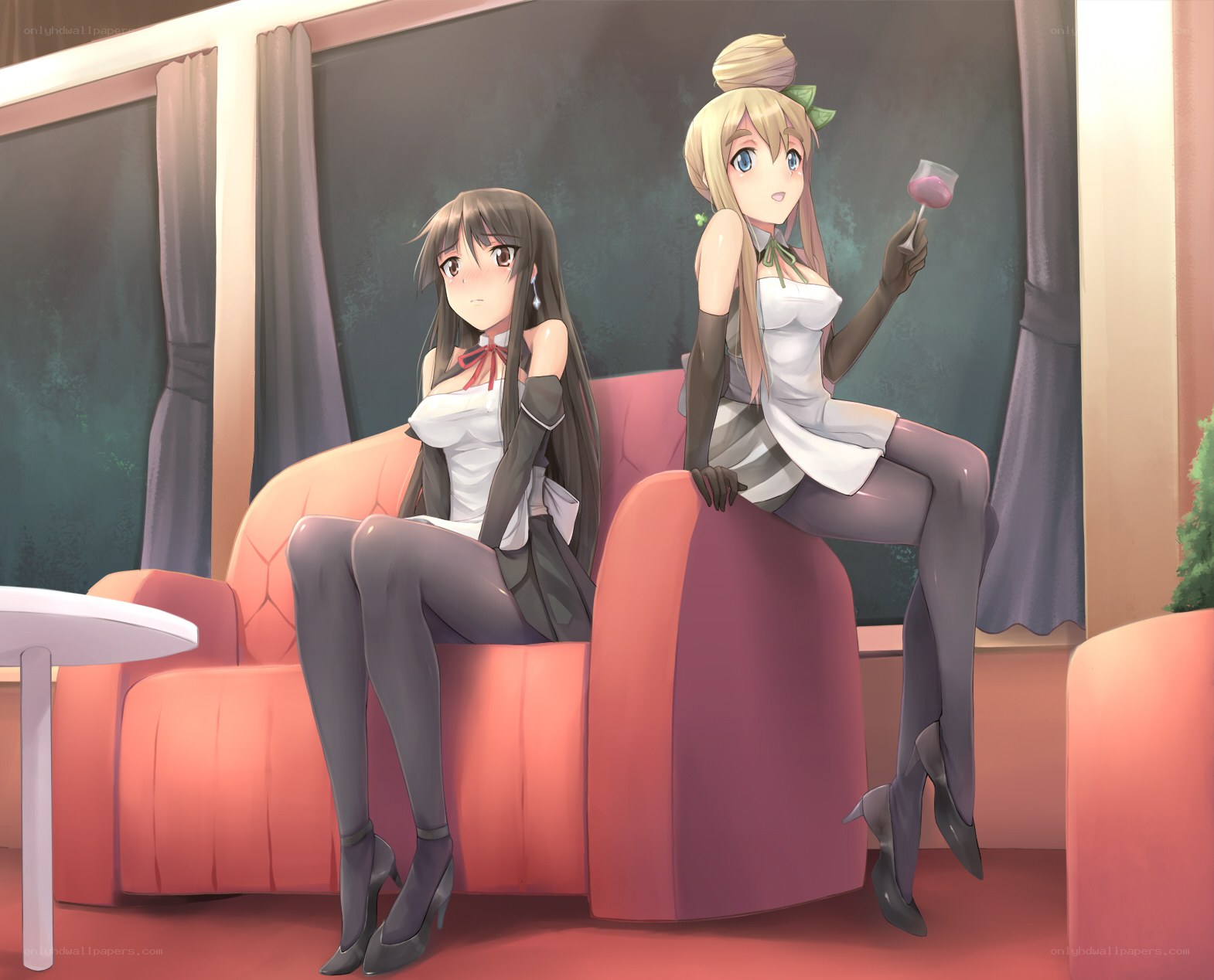Two girls on a couch
