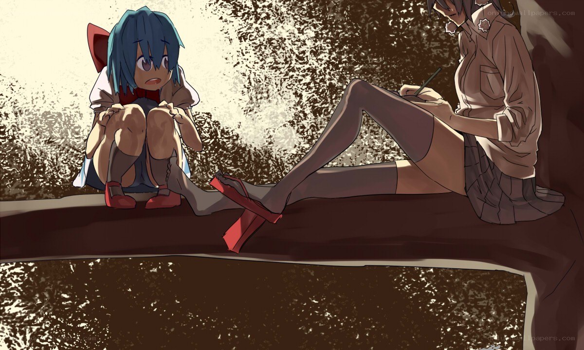 Two girls on a log