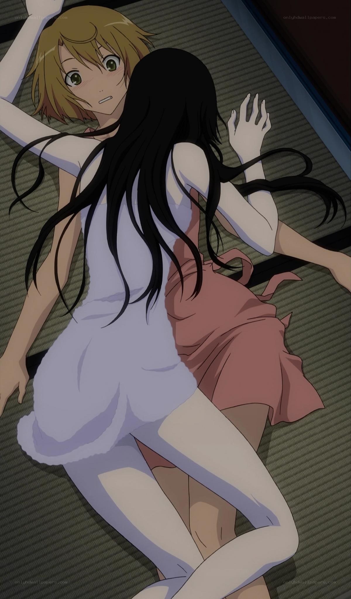 Two girls on a mat