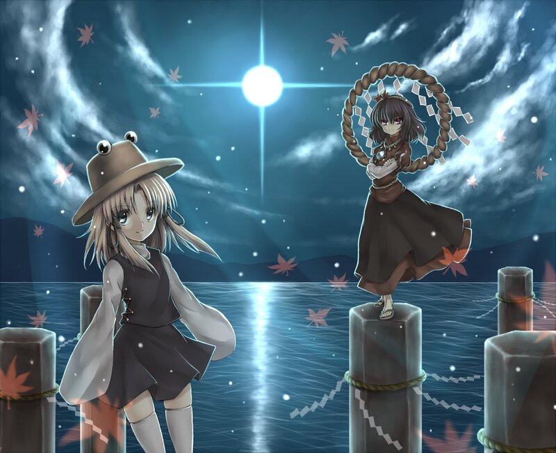 Two girls on a moonlit pier