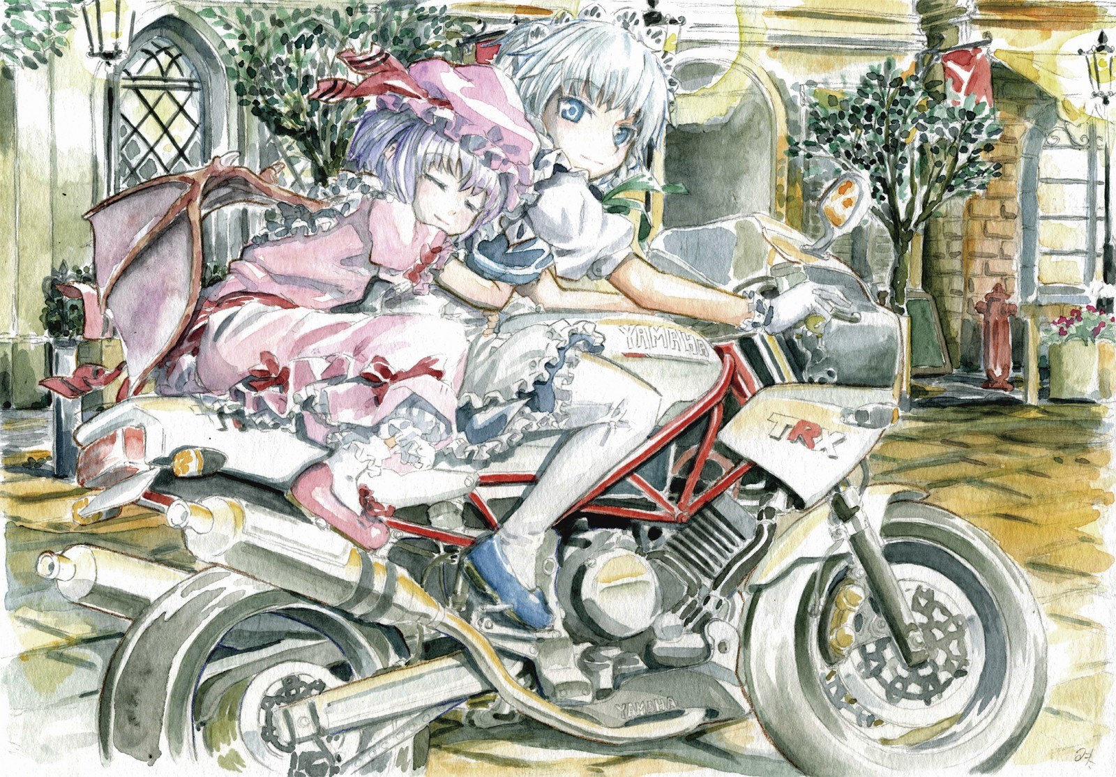 Two girls on a motorcycle