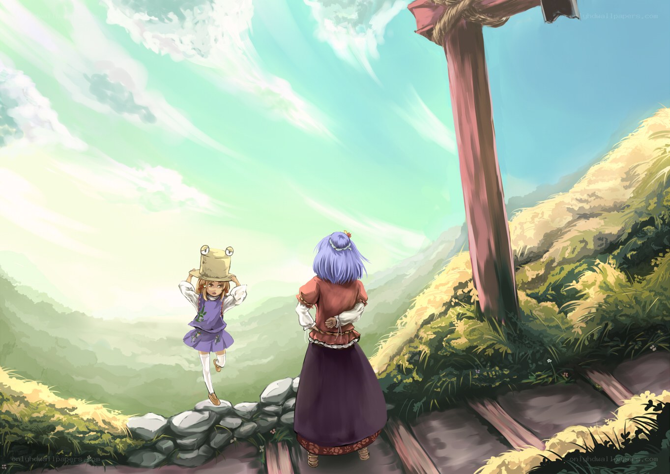 Two girls on a mountain path