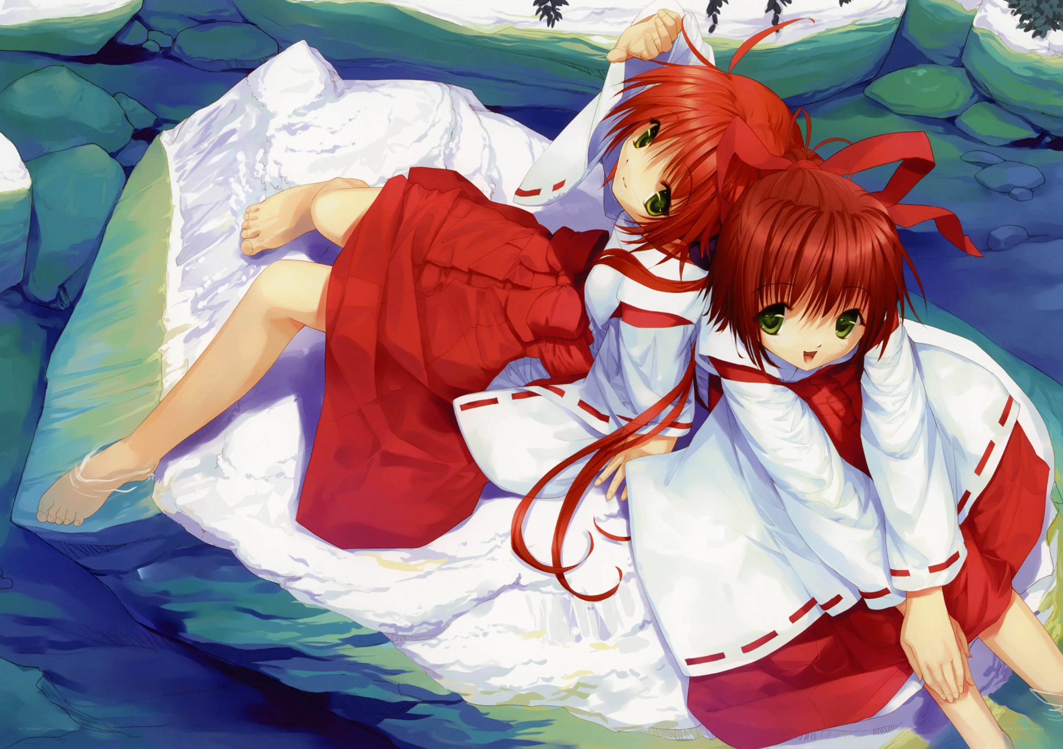 Two girls on a rock